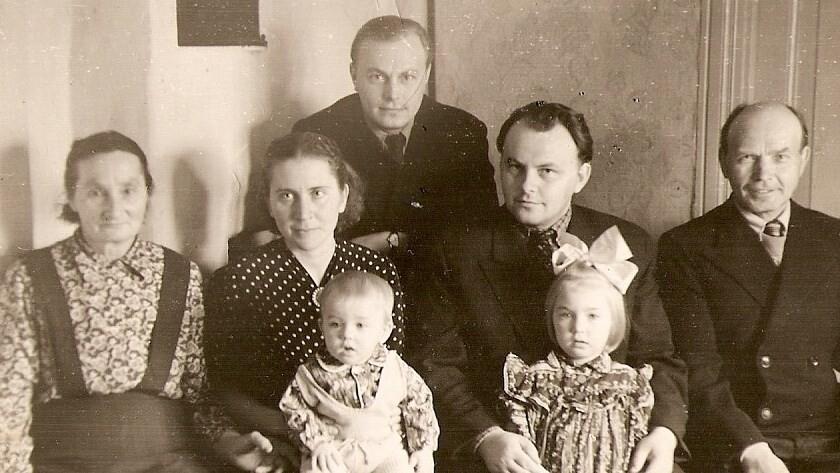 Karl seated second from right. His father Aleksander (back from Siberia) at right.