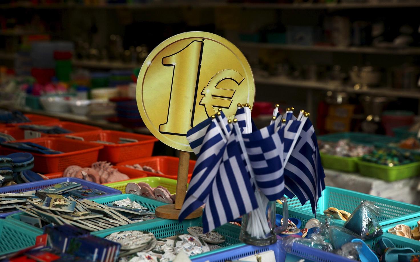 Kreeka lipp ja Euroopa ühisraha euro kujutis.