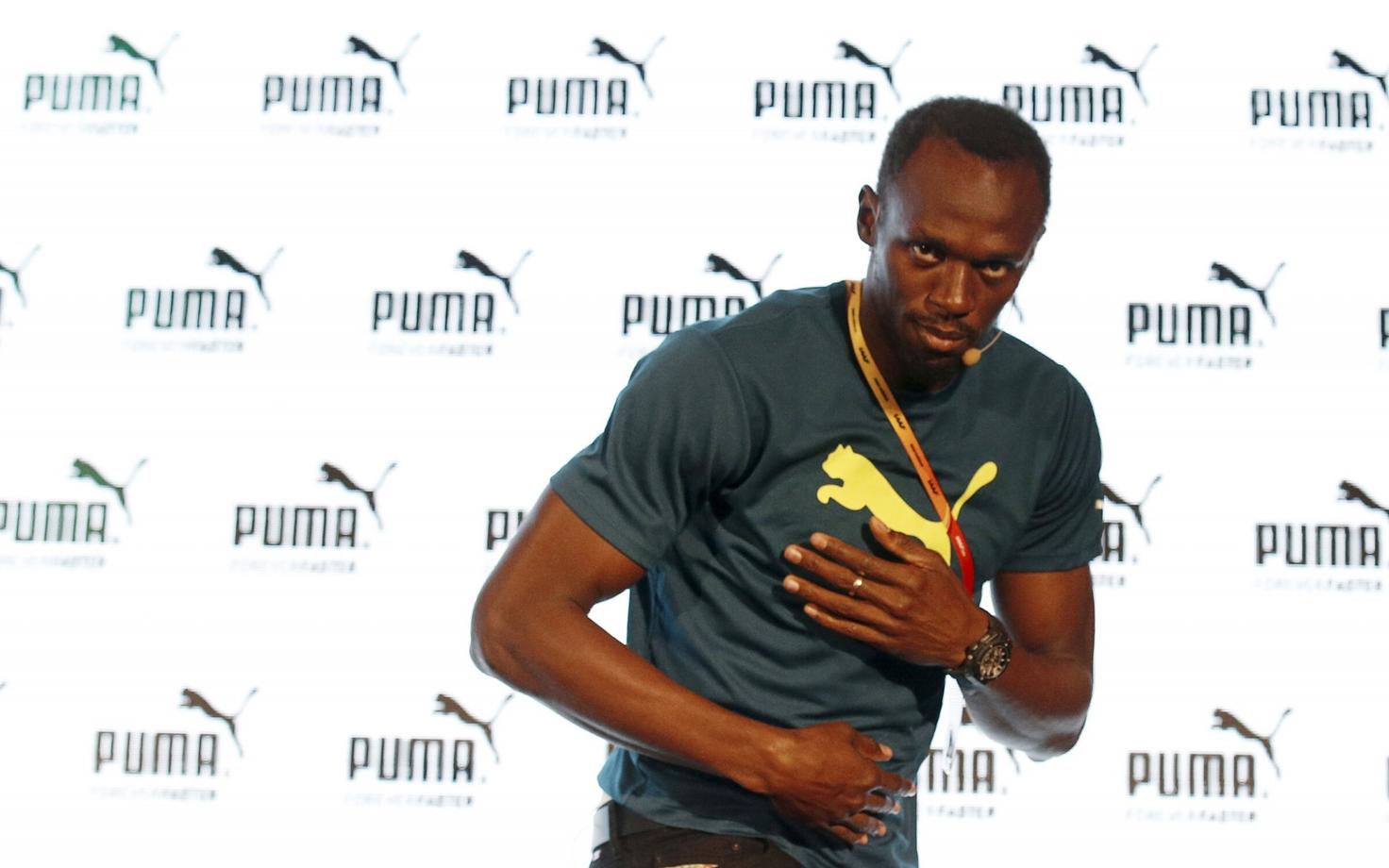 Usain Bolt andis MM-i eel Pekingis pressikonverentsi.