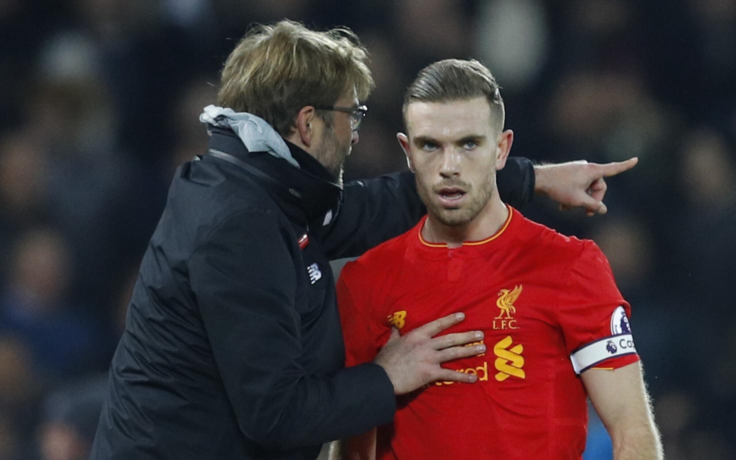 Jürgen Klopp ja Jordan Henderson