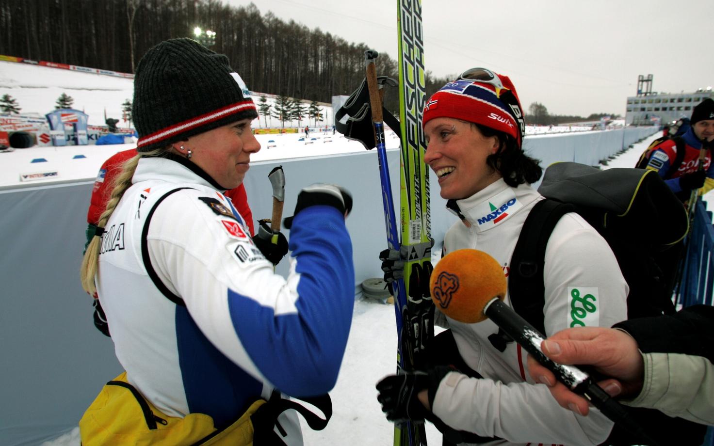 Kristina Šmigun ja Marit Björgen 2007. aastal.