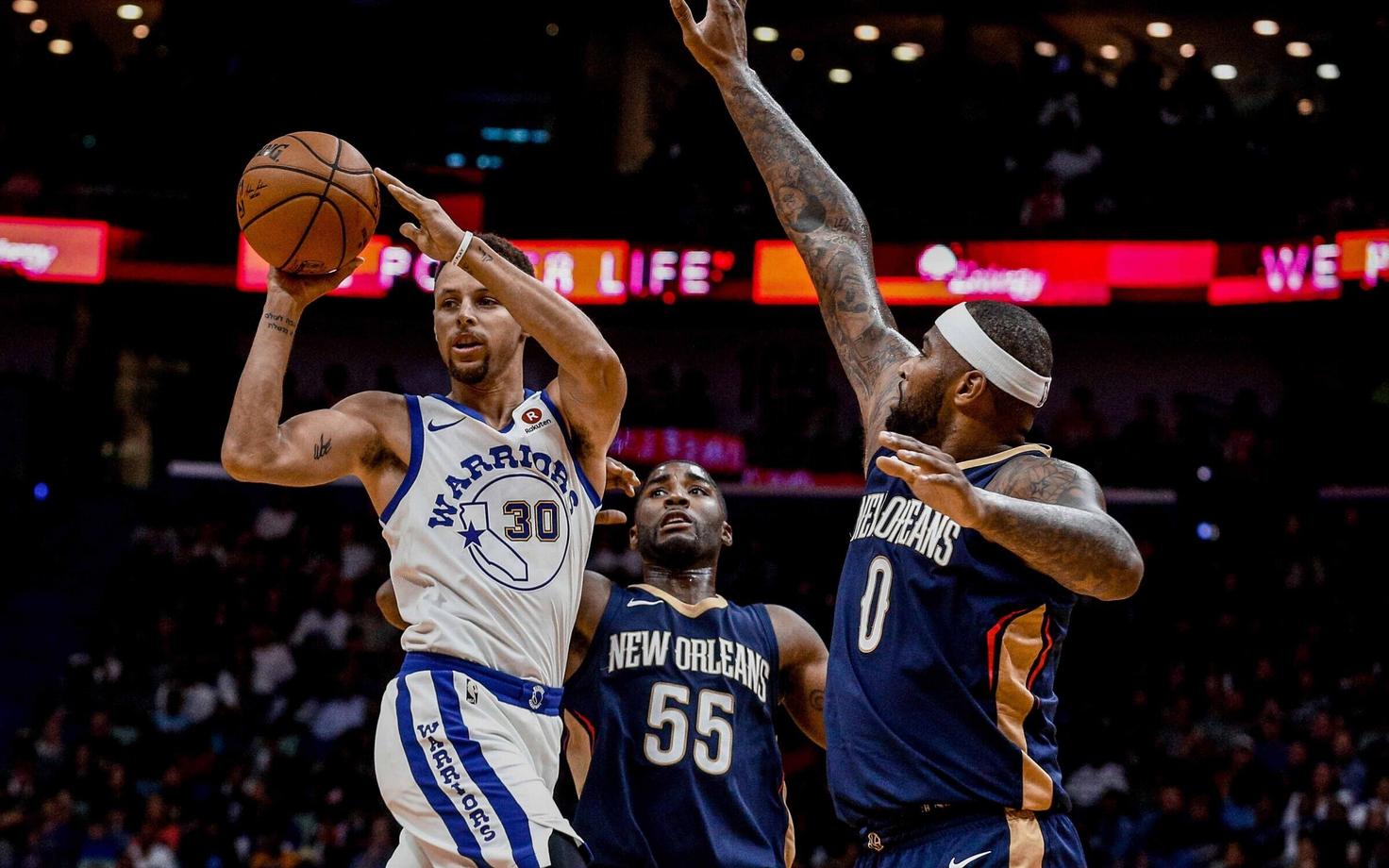 Stephen Curry, Twaun Moore, DeMarcus Cousins