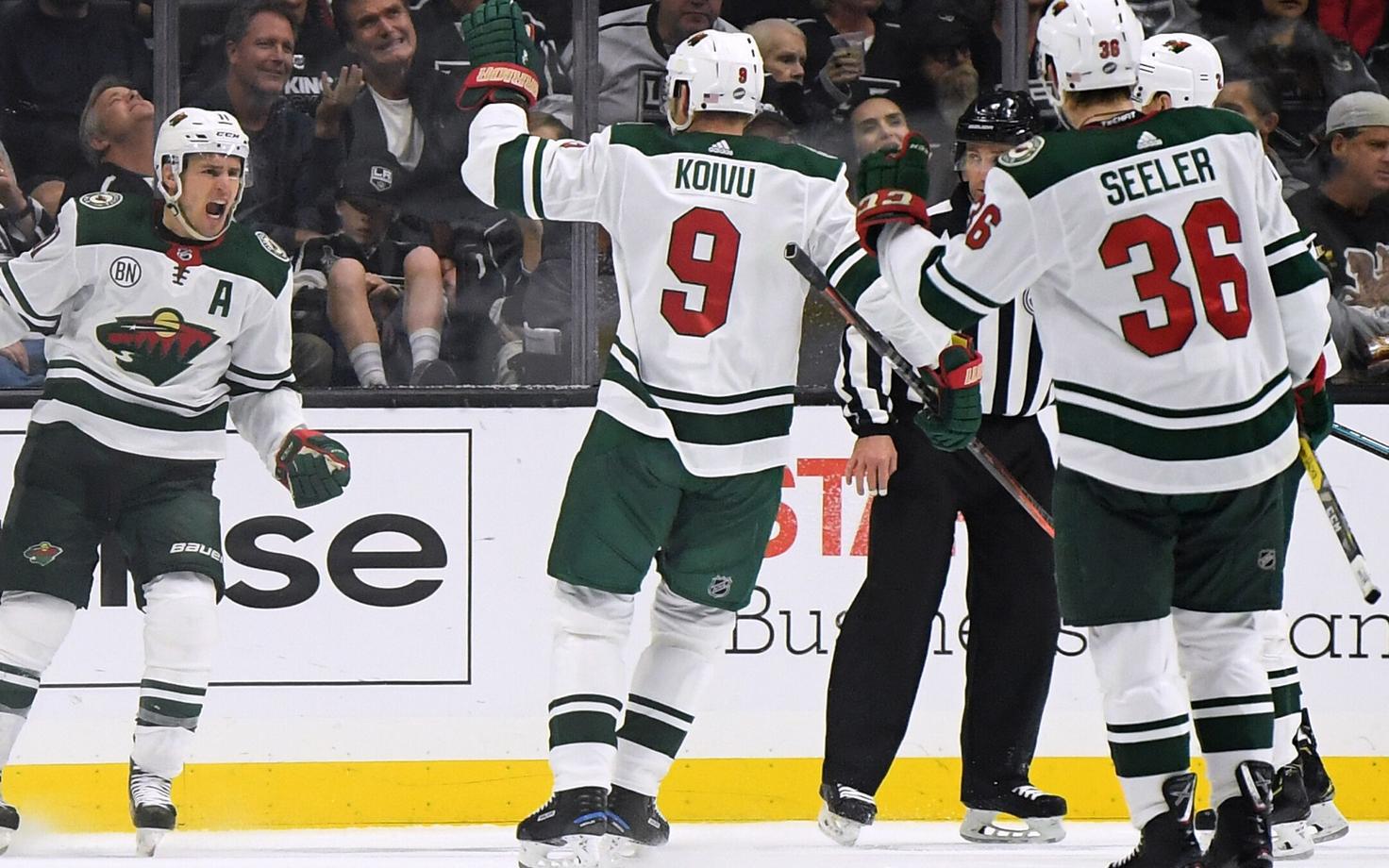 Zach Parise (vasakul)