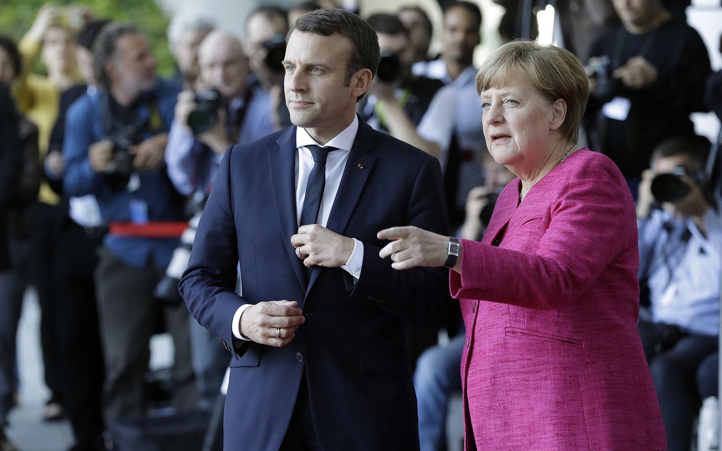 Emmanuel Macron ja Angela Merkel.