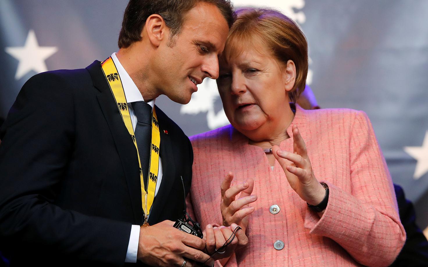 Emmanuel Macron ja Angela Merkel.