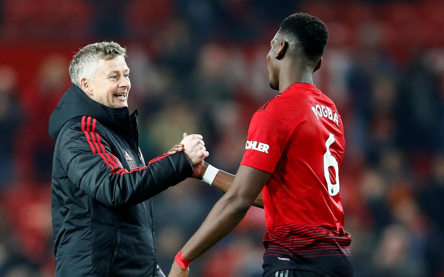 Ole Gunnar Solskjaer ja Paul Pogba