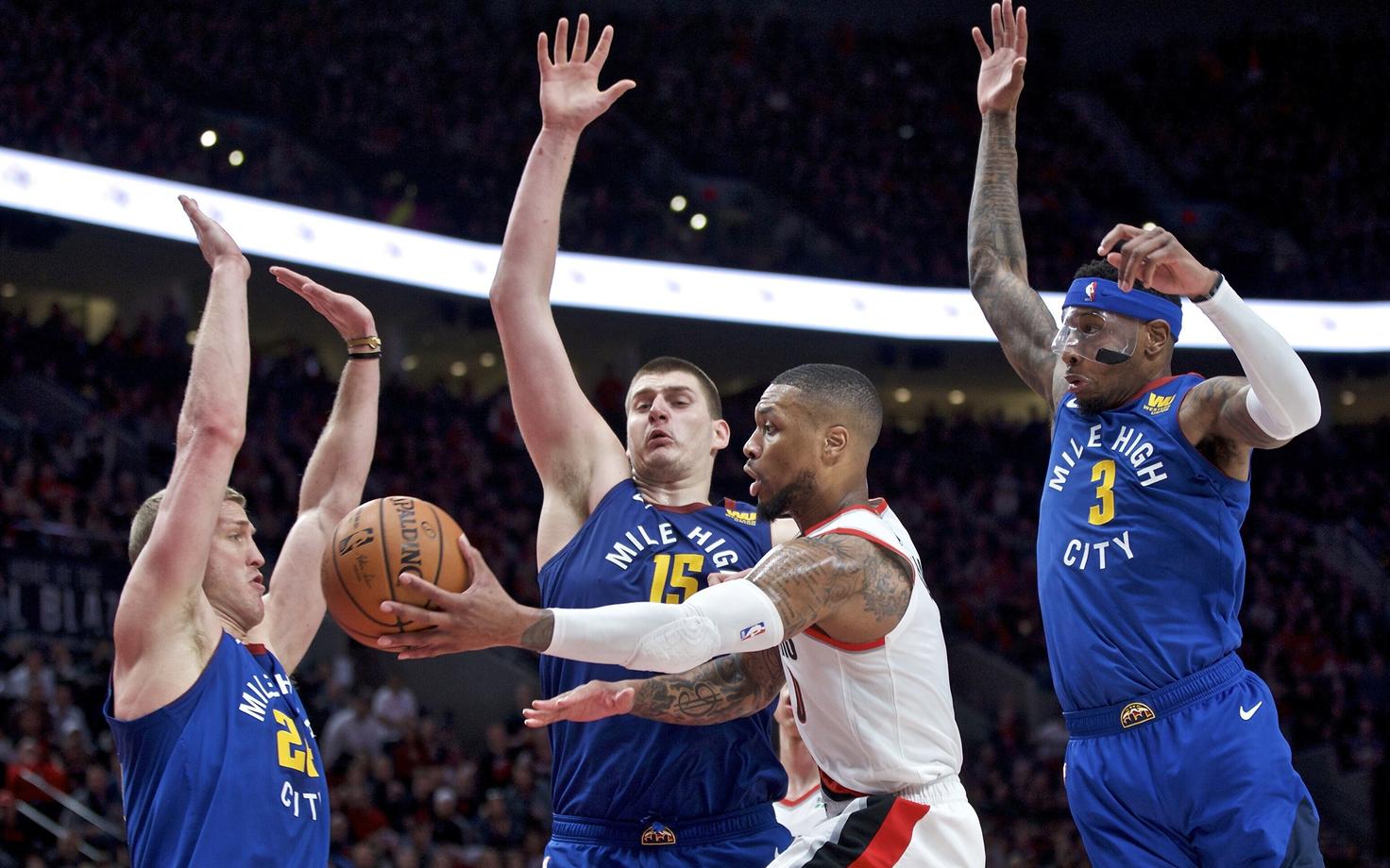 Damian Lillard Denver Nuggetsi kaitse vastu