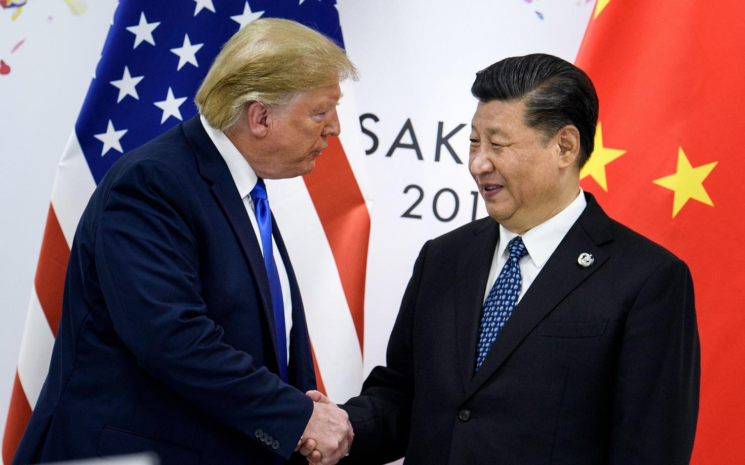 Президент США Дональд Трамп и председатель КНР Си Цзиньпин на встрече в Осаке.