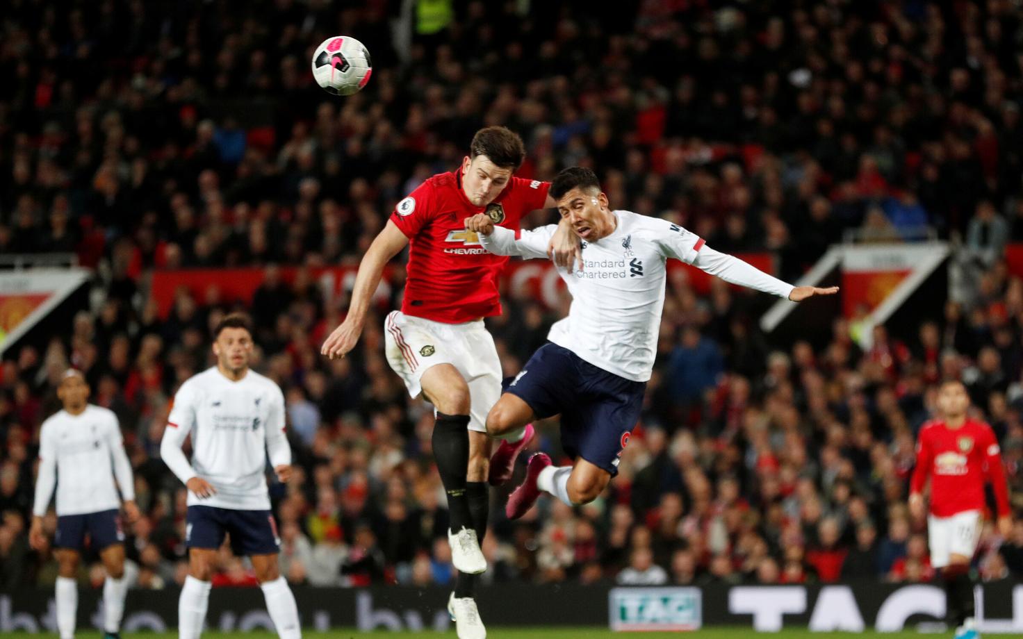 Harry Maguire (Manchester United) ja Roberto Firmino (Liverpool)