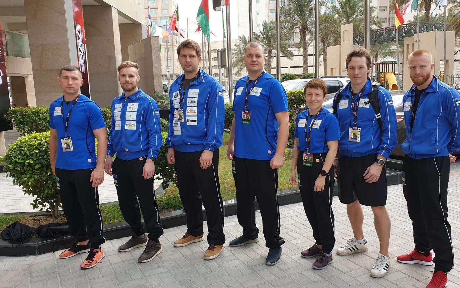 Eesti koondis sportliku vabavõitluse MM-il Bahreinis 2019. aastal. Vasakult Juri Gribovski (spordiklubi Tokon treener), Kaupo Kokamägi, Kimmo Meier, Vallo Hannus (spordiklubi 3D Treening treener), Ksenija Grabova, Ergo Reinvald, Sergei Strinža.