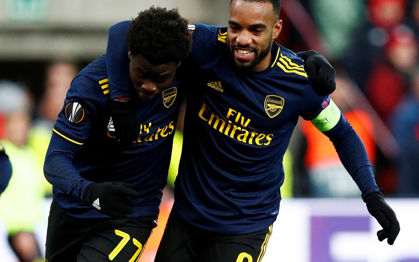 Bukayo Saka ja Alexandre Lacazette