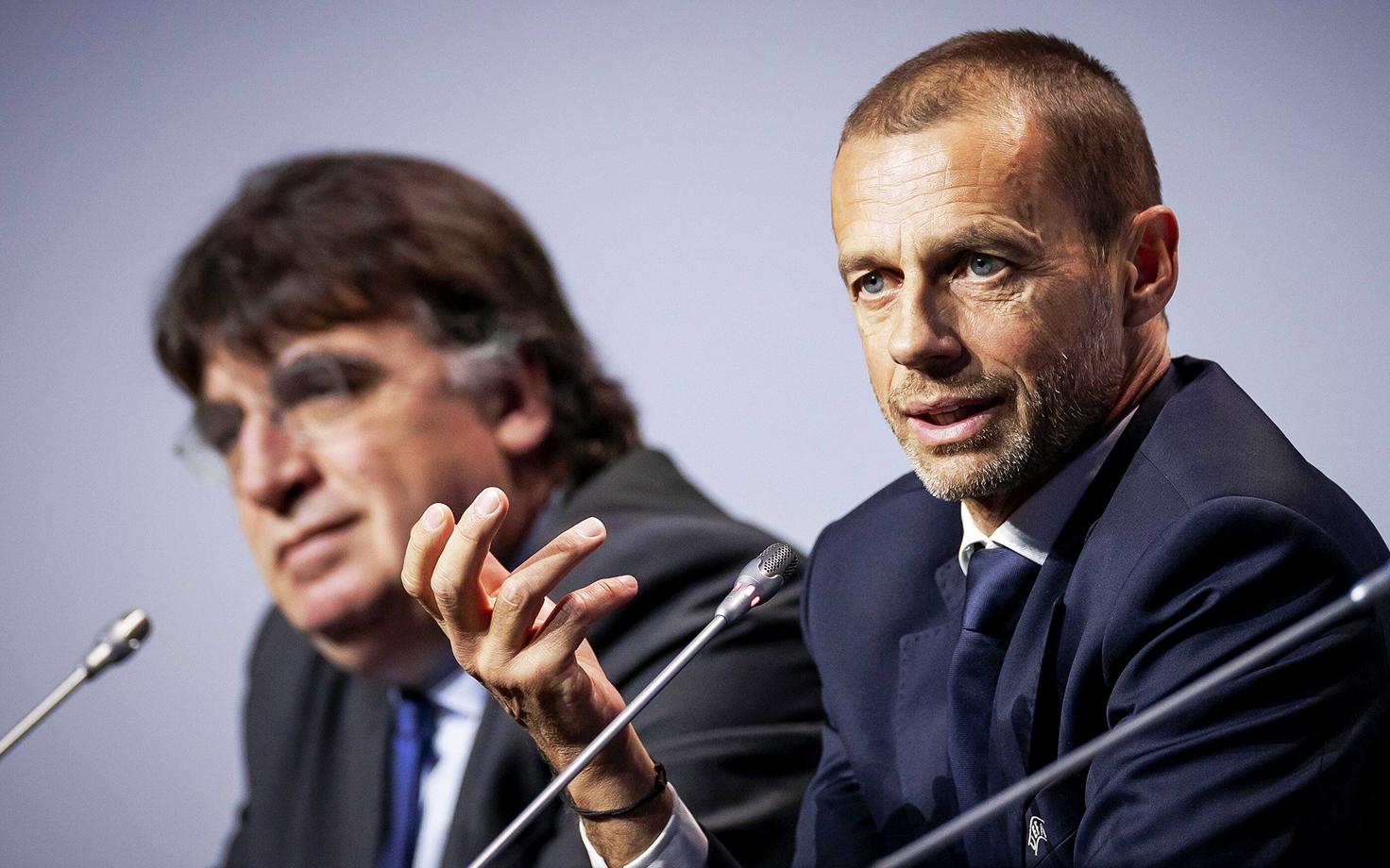 UEFA peasekretär Theodore Theodoridis (vasakul) ja president Aleksander Ceferin
