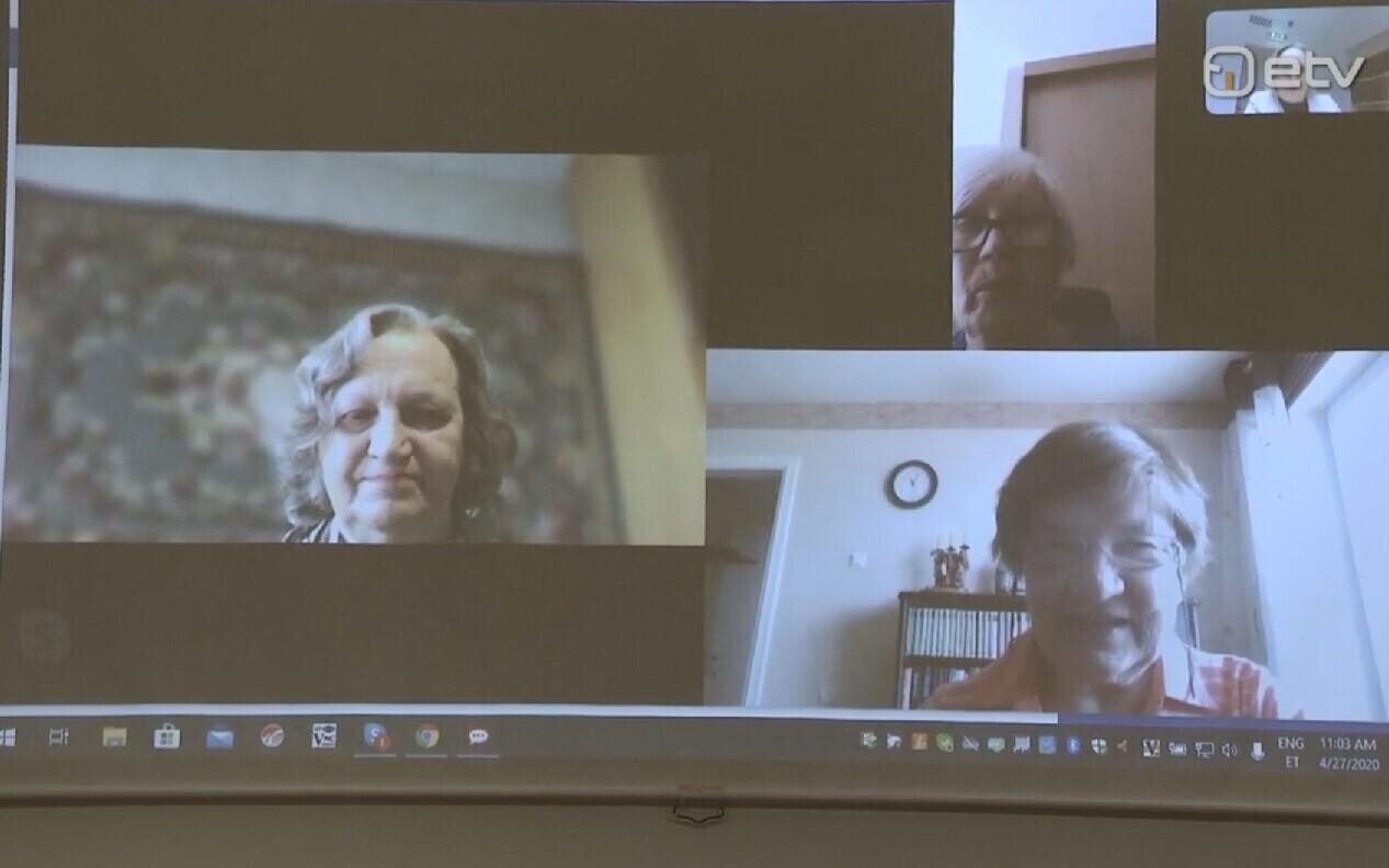 The elderly skyping.