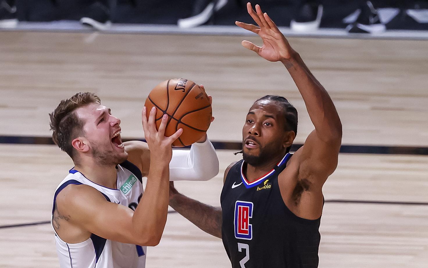 Dallas resultatiivseim mängija Luka Doncic ja Clippersi parim punktitooja Kawhi Leonard