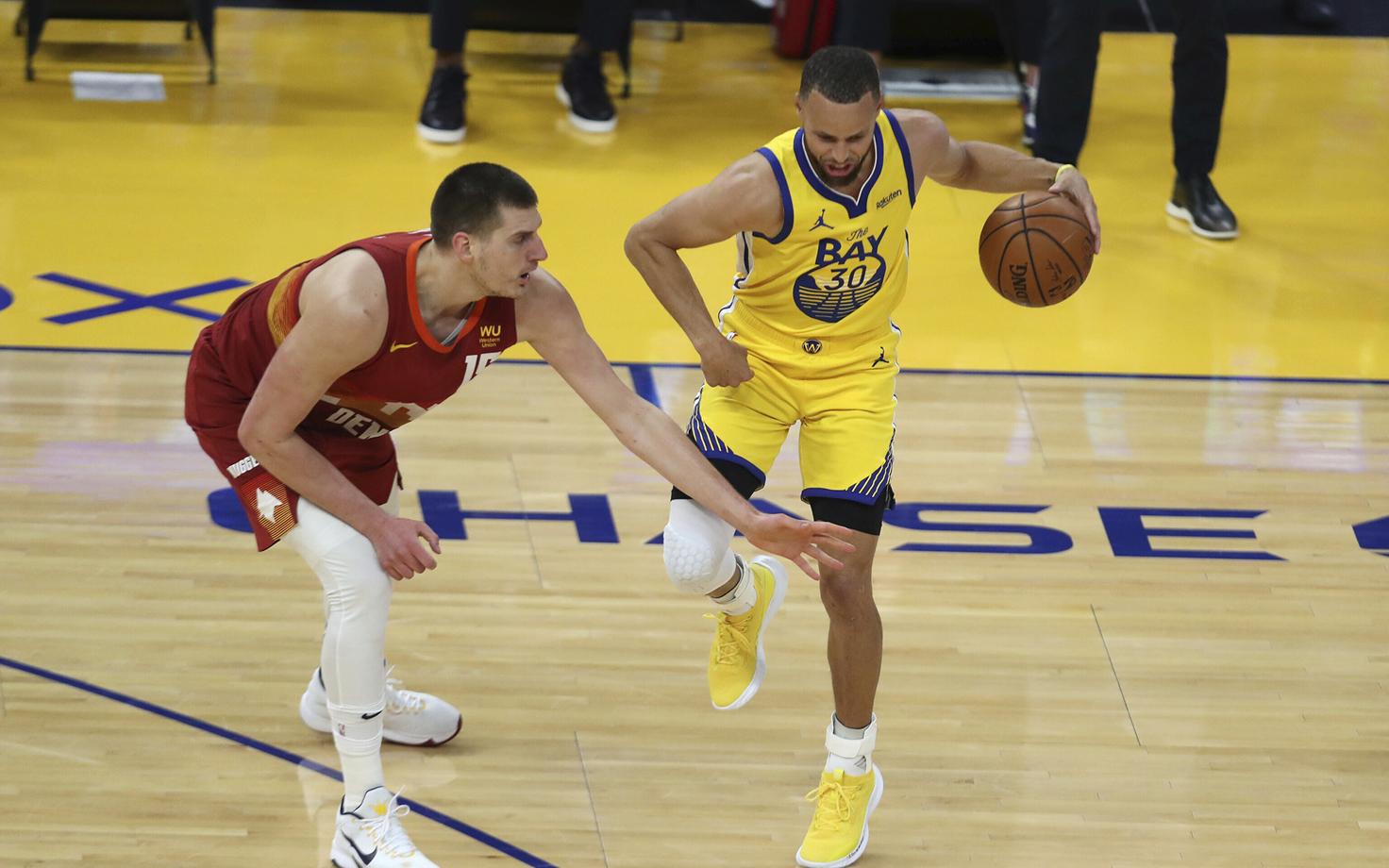 Nikola Jokic ja Stephen Curry