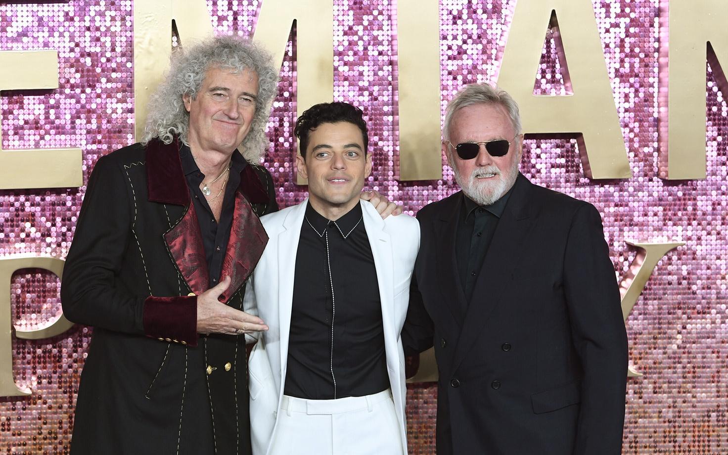 Queeni liikmed Brian May ja Roger Taylor näitleja Rami Malekiga, kes filmis Freddie Mercuryt mängis