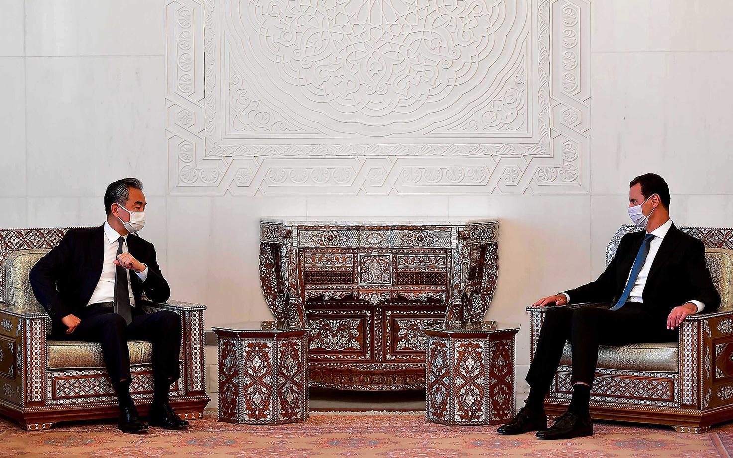 Hiina välisminister Wang Yi ja Süüria president Bashar al-Assad