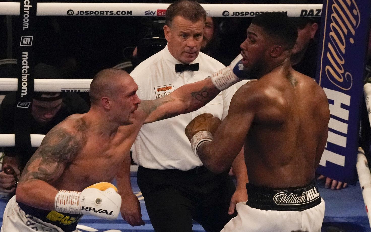 Oleksandr Ussõk (vasakul) ja Anthony Joshua (paremal)
