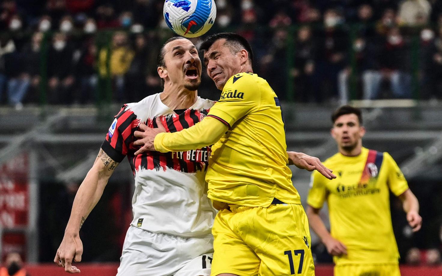 Zlatan Ibrahimovic (Milan) ja Gary Medel (Bologna)