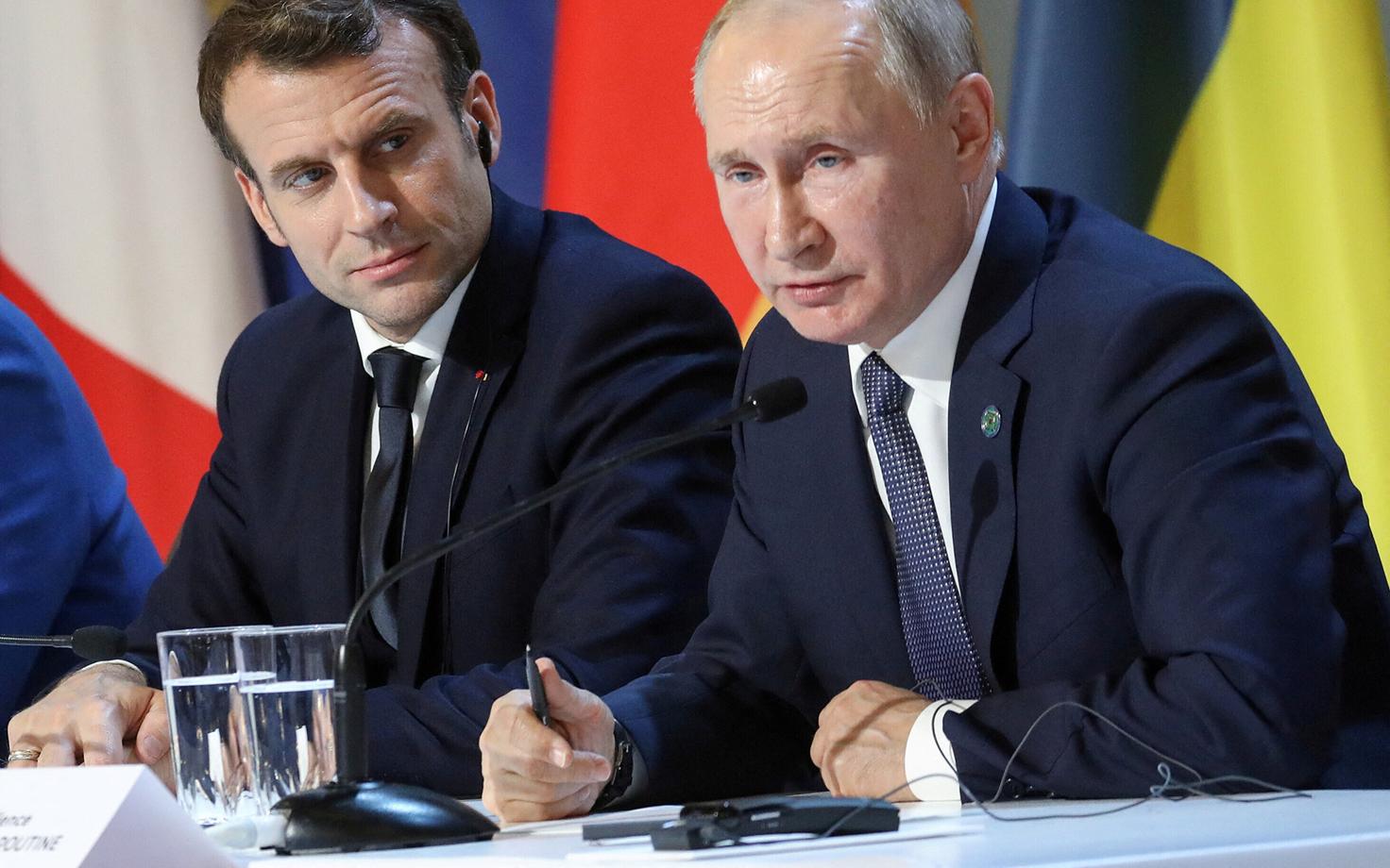 Эммануэль Макрон и Владимир Путин.