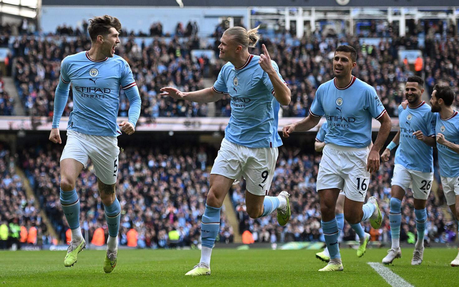 Vasakult: John Stones, Erling Haaland ja Rodri