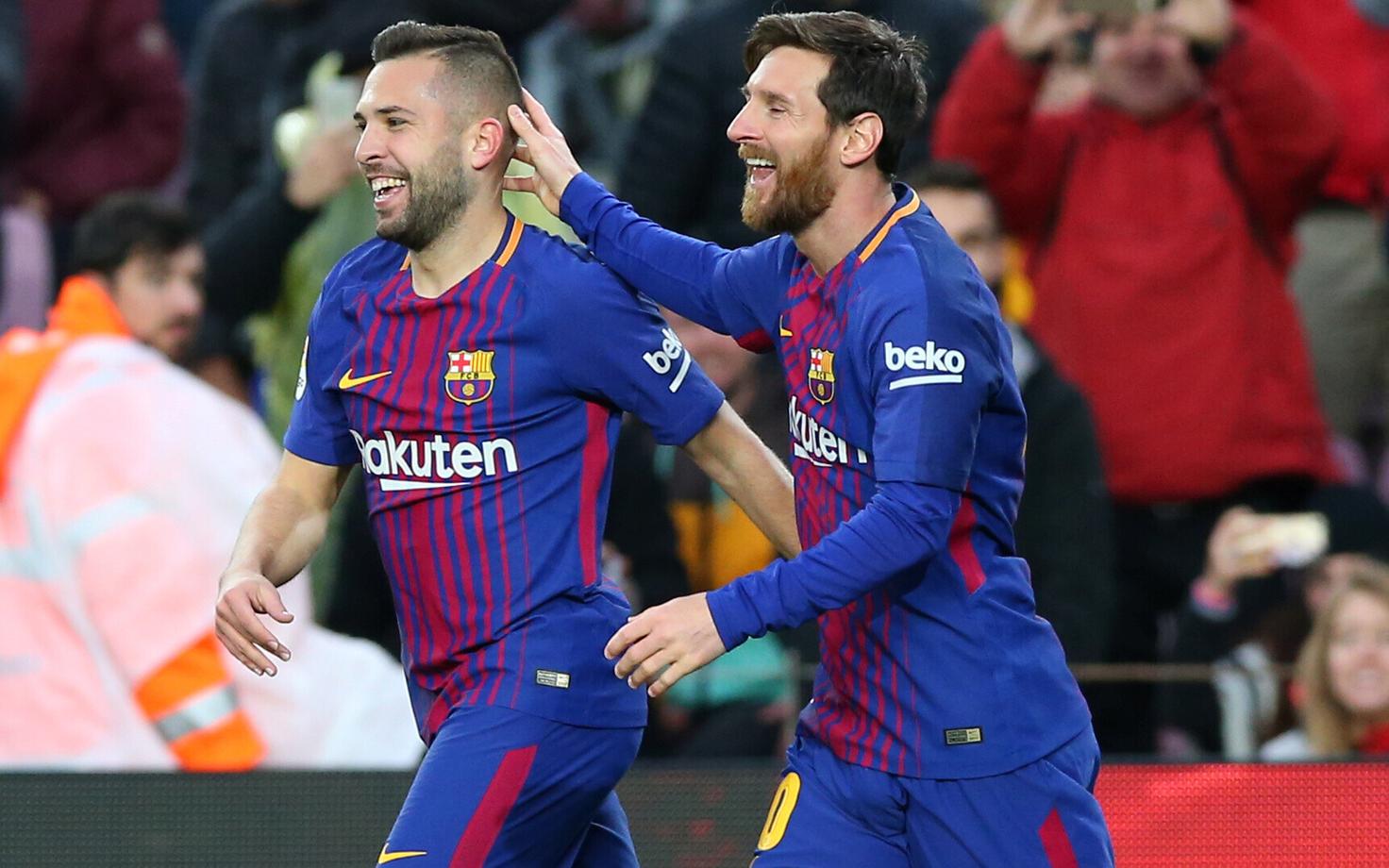 Jordi Alba (vasakul) ja Lionel Messi