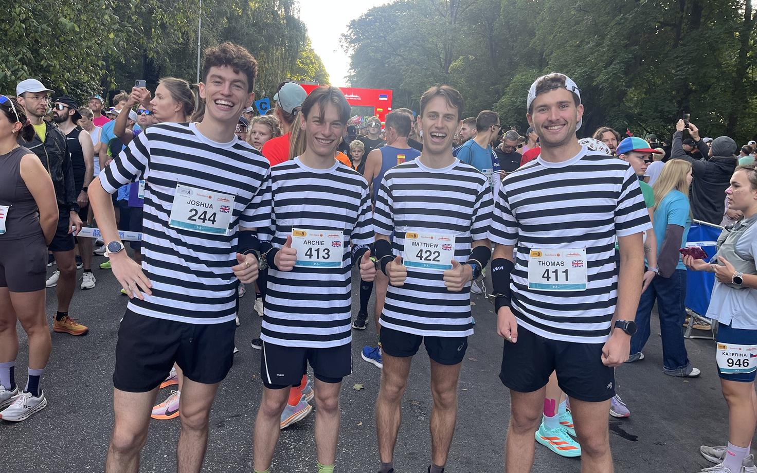 The four Englishman had little choice in finishing the half marathon with exactly the same time - just under 90 minutes - as they were all running handcuffed together.