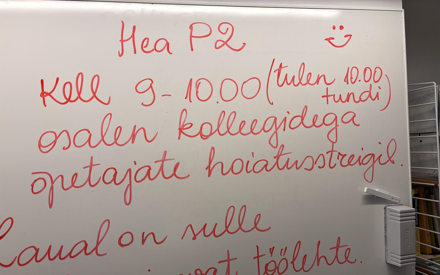 A message on a whiteboard telling students the teacher will be at the warning strike in Paide High School.